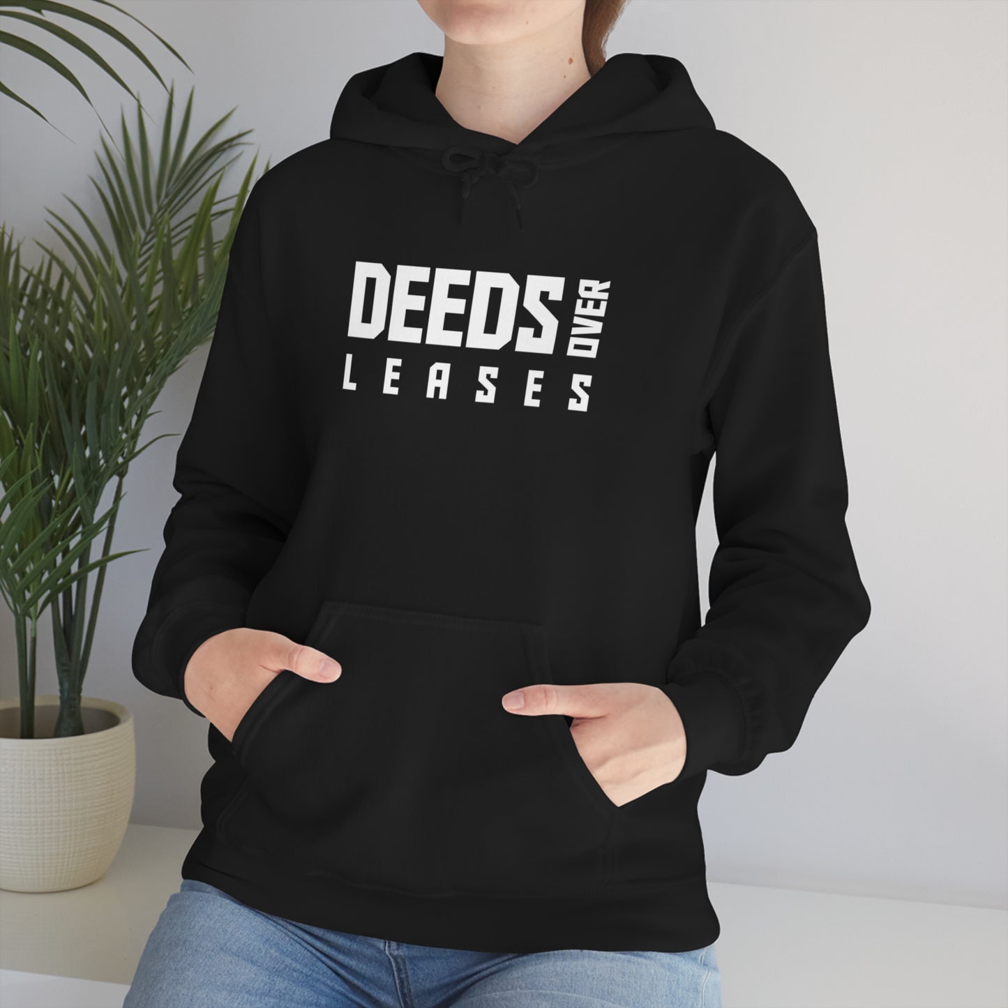 "Deeds over Leases" Unisex Heavy Blend™ Hooded Sweatshirt